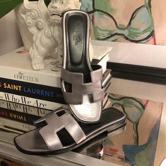 Hermes Shoes - Oran Slide Sandals in Metallic Silver